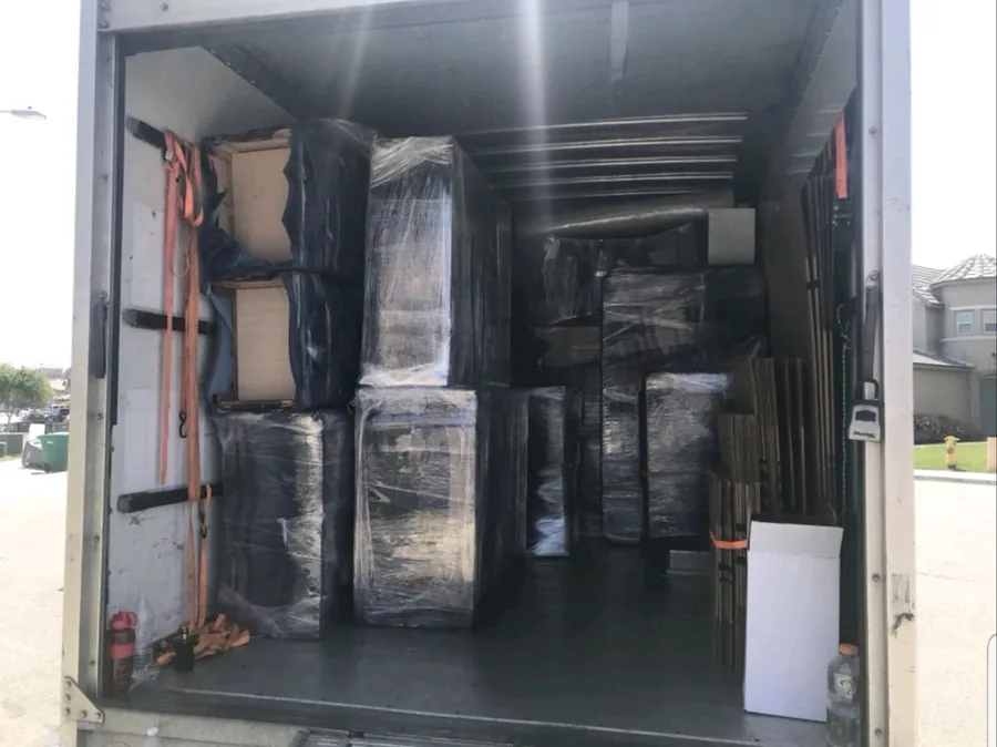A2 Moving truck loaded with wrapped furniture