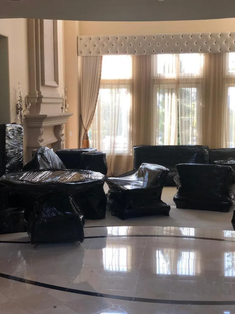 Furniture wrapped inside luxury home before move